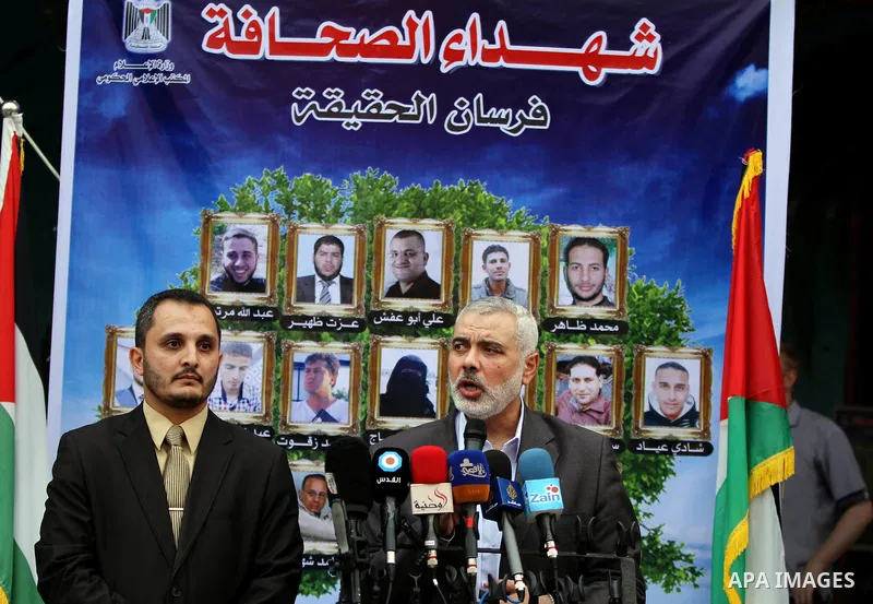 Palestinian top Hamas leader in Gaza, Ismail Haniyeh, speaks during a ceremony honoring to Journalists's families in Gaza city on 30 August 2014. An indefinite ceasefire to end seven weeks of fighting between Israel and...