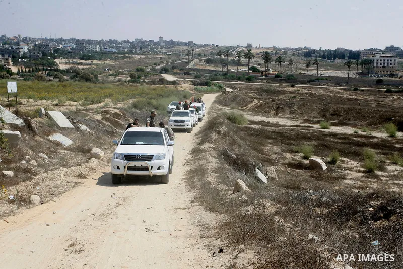 Palestinian security forces inspect security headquarters destroyed during fighting between Hamas militants and Israel on the border between Egypt and Gaza in Rafah, southern Gaza Strip in August 31, 2014. An indefinite...