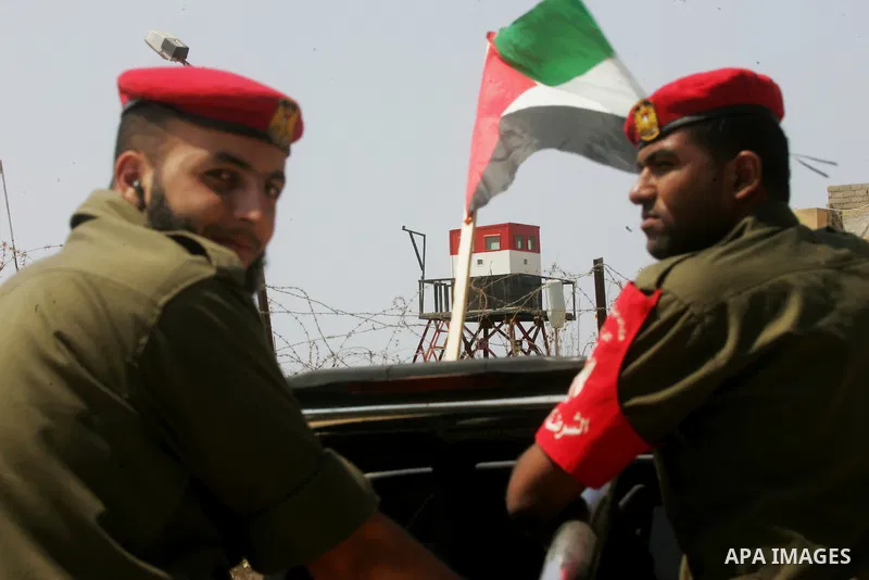 Palestinian security forces inspect security headquarters destroyed during fighting between Hamas militants and Israel on the border between Egypt and Gaza in Rafah, southern Gaza Strip in August 31, 2014. An indefinite...