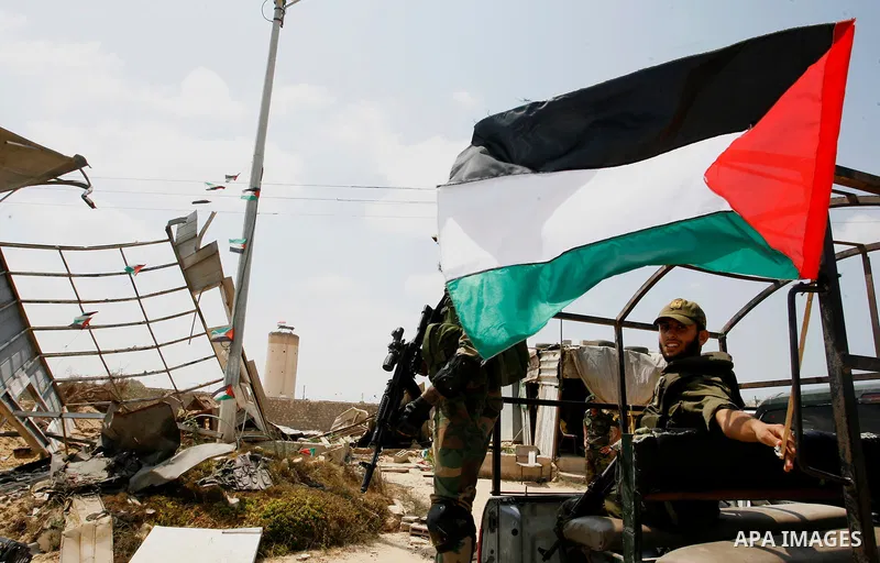 Palestinian security forces inspect security headquarters destroyed during fighting between Hamas militants and Israel on the border between Egypt and Gaza in Rafah, southern Gaza Strip in August 31, 2014. An indefinite...
