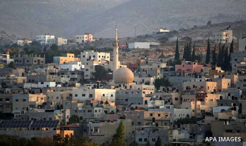 A general view shows the houses of al-Faraa refugee camp near the West Bank City of Jenin Sep. 01, 2014. Israeli soldiers raided many houses and detained 7 Palestinians. Photo by Nedal Eshtayah
