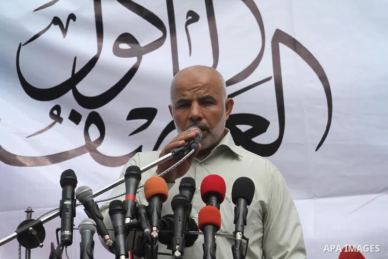 Director of the association wa'd for the prisoners, Tawfiq Abu Naim speaks during a a protest, in front of the Red Cross office in Gaza City, on Feb. 03, 2014. Photo by Mohammed Asad