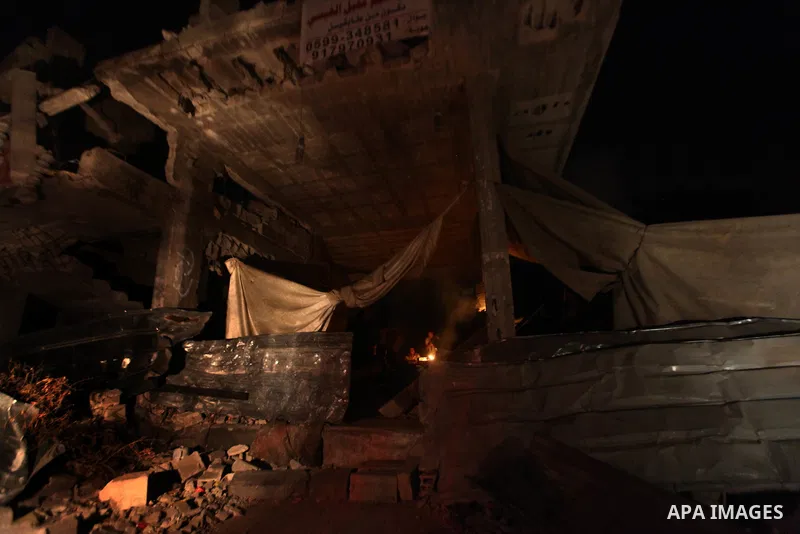 Palestinians gather the remains of their house that witnesses said were destroyed in an Israeli offensive, after a ceasefire was declared in the Shejaia neighbourhood, east of Gaza City. September 1, 2014. Calm returned...