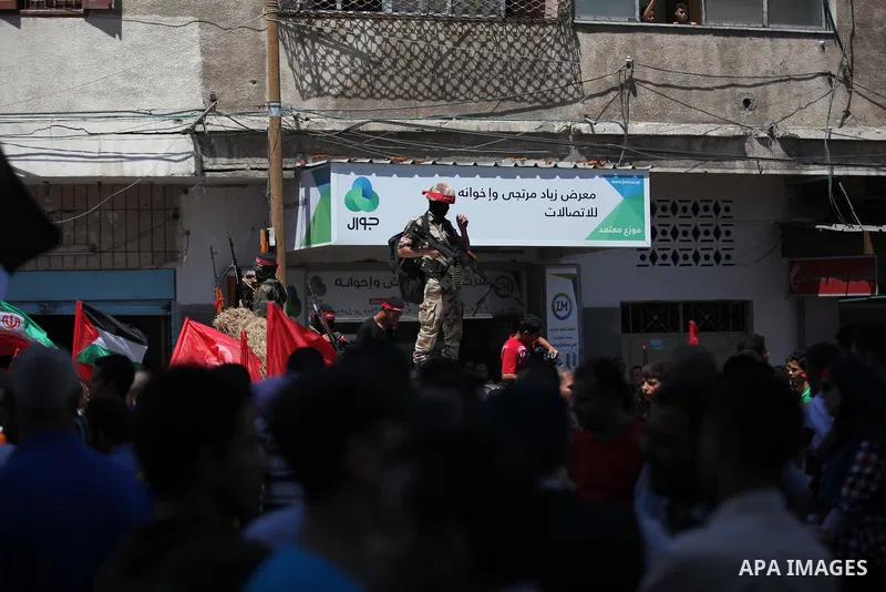 Palestinian militants from the Popular Front for the Liberation of Palestinian (PFLP) take part in a military show in Gaza City September 2, 2014. An open-ended ceasefire between Israel and Hamas-led Gaza militants, medi...