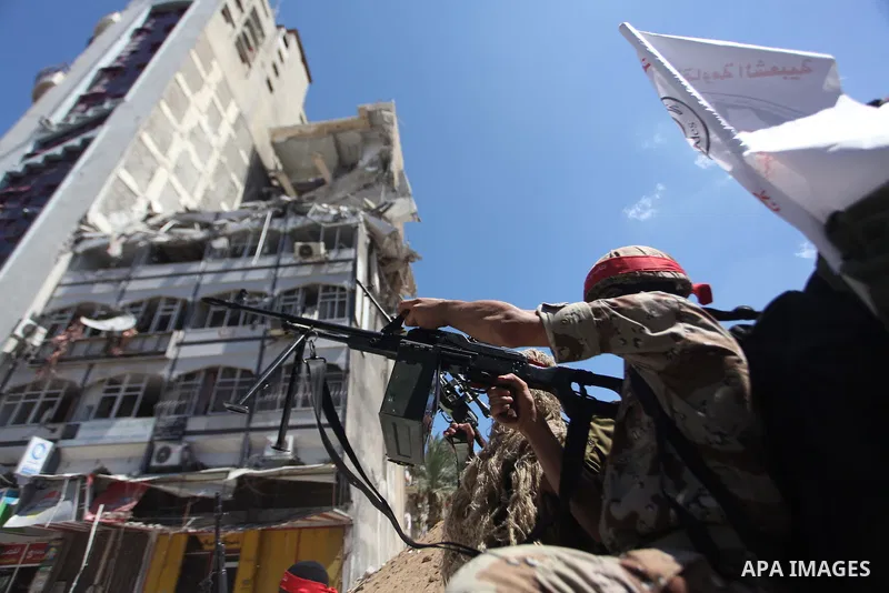 Palestinian militants from the Popular Front for the Liberation of Palestinian (PFLP) take part in a military show in Gaza City September 2, 2014. An open-ended ceasefire between Israel and Hamas-led Gaza militants, medi...