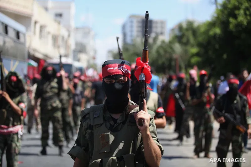 Palestinian militants from the Popular Front for the Liberation of Palestinian (PFLP) take part in a military show in Gaza City September 2, 2014. An open-ended ceasefire between Israel and Hamas-led Gaza militants, medi...