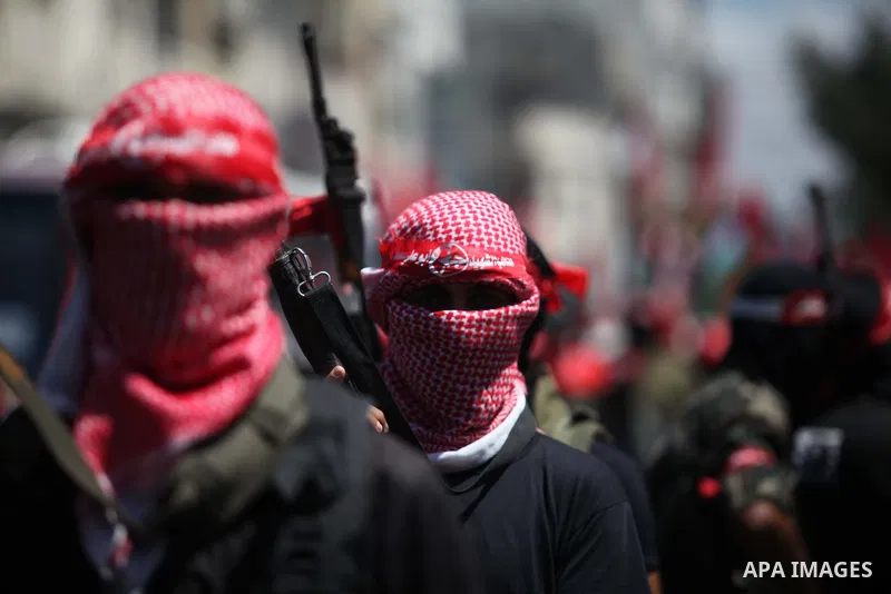 Palestinian militants from the Popular Front for the Liberation of Palestinian (PFLP) take part in a military show in Gaza City September 2, 2014. An open-ended ceasefire between Israel and Hamas-led Gaza militants, medi...