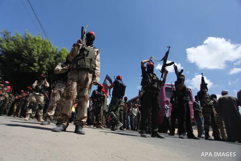 Palestinian militants from the Popular Front for the Liberation of Palestinian (PFLP) take part in a military show in Gaza City September 2, 2014. An open-ended ceasefire between Israel and Hamas-led Gaza militants, medi...