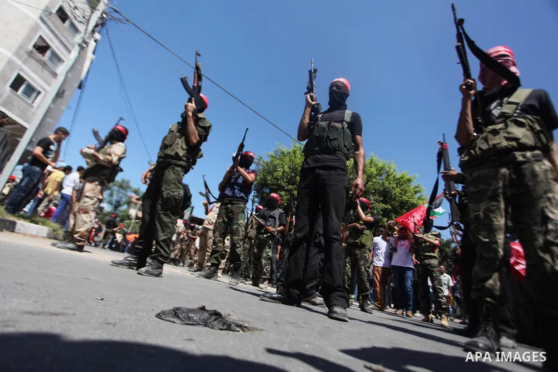 Palestinian militants from the Popular Front for the Liberation of Palestinian (PFLP) take part in a military show in Gaza City September 2, 2014. An open-ended ceasefire between Israel and Hamas-led Gaza militants, medi...