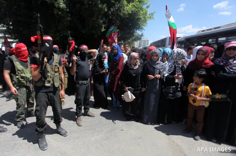 Palestinian militants from the Popular Front for the Liberation of Palestinian (PFLP) take part in a military show in Gaza City September 2, 2014. An open-ended ceasefire between Israel and Hamas-led Gaza militants, medi...