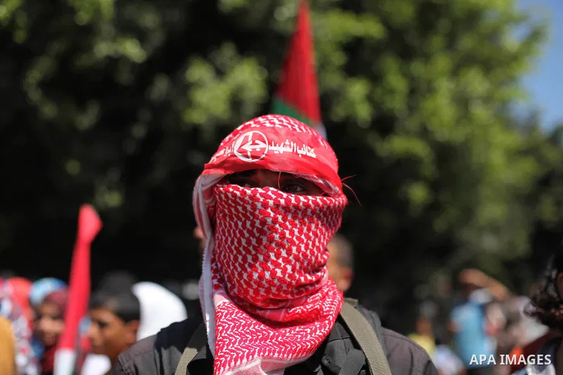 Palestinian militants from the Popular Front for the Liberation of Palestinian (PFLP) take part in a military show in Gaza City September 2, 2014. An open-ended ceasefire between Israel and Hamas-led Gaza militants, medi...