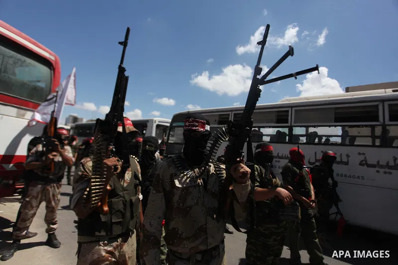 Palestinian militants from the Popular Front for the Liberation of Palestinian (PFLP) take part in a military show in Gaza City September 2, 2014. An open-ended ceasefire between Israel and Hamas-led Gaza militants, medi...