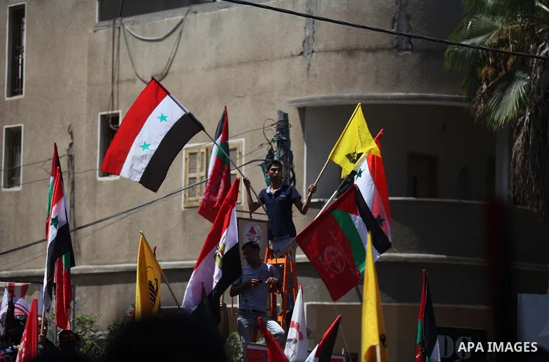 Palestinian militants from the Popular Front for the Liberation of Palestinian (PFLP) take part in a military show in Gaza City September 2, 2014. An open-ended ceasefire between Israel and Hamas-led Gaza militants, medi...