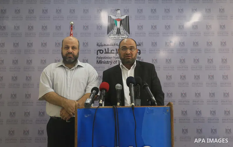 Palestinian Undersecretary of Minister of Awqaf and Religious Affairs, Hassan El-Safi, speaks during a Press conference, in Gaza city, on Sep. 03, 2014. Photo by Mohammed Asad