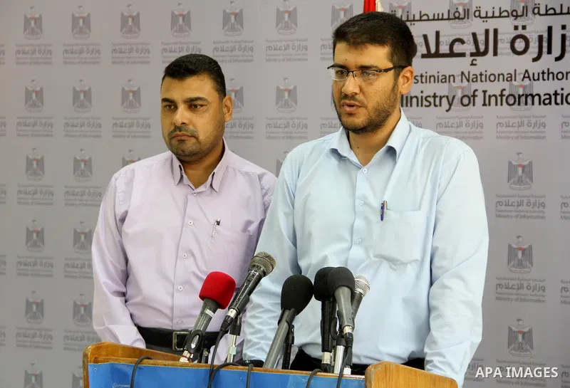 Undersecretary of the Palestinian Ministry of Health, Yousef Abu Rish, speaks during a press conference, in Gaza city on September 4, 2014. Photo by Mohammed Asad
