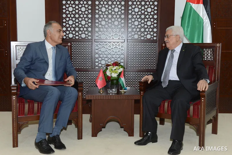 Palestinian President, Mahmoud Abbas (Abu Mazen) meets with Morocco Minister of Foreign in the West Bank city of Ramallah on September 4, 2014. Photo by Thaer Ganaim