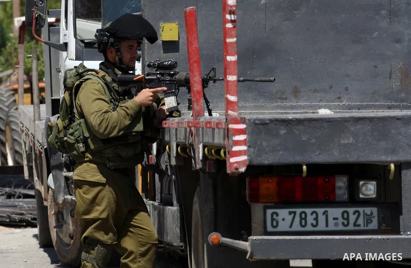 Israeli military patrol the streets during a military operation at Al-Nassariya village near the West Bank city of Nablus, on Sep. 04, 2014. Photo by Nedal Eshtayah
