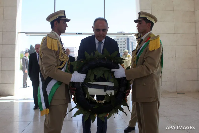 Salah-Eddine Mezouar, Morocco Minister of Foreign, lays a wreath at the grave of the late Palestinian chairman Yasser Arafat, in the West bank city of Ramallah on September 4, 2014. Photo by Shadi Hatem
