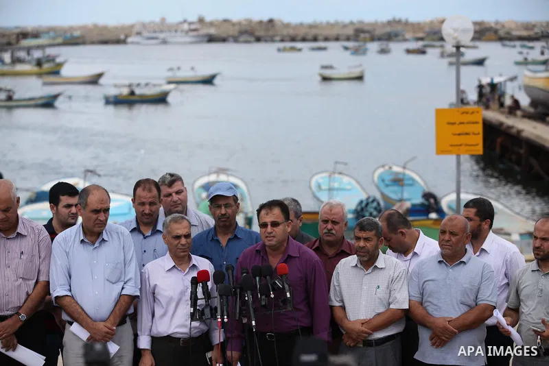 Director of Planning and Policies the Ministry of Agriculture, Nabil Abu Shamala, speaks during a press conference, at Gaza's seaport in Gaza City on Sep. 06, 2014. Photo by Ashraf Amra