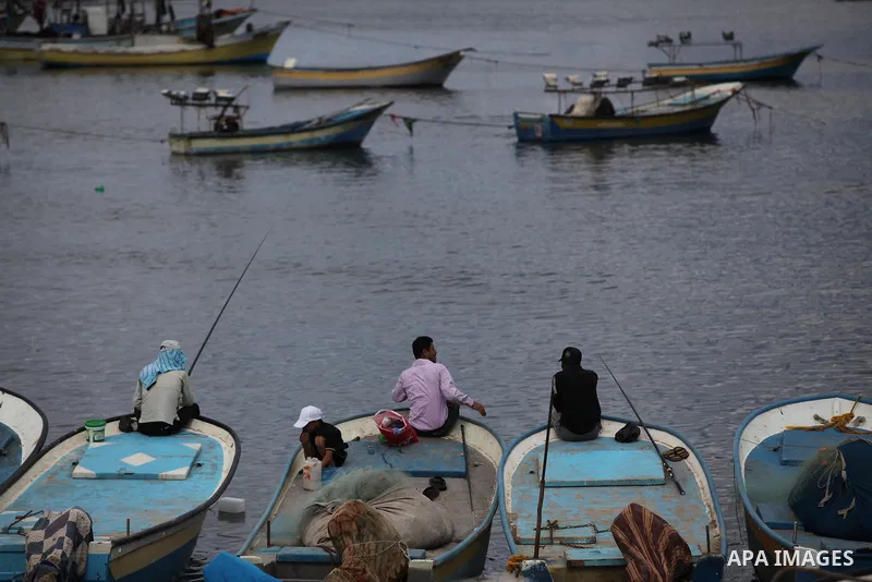 Palestinian fishermen cast their nets at Gaza's seaport in Gaza City on Sep. 06 2014. Israel and Hamas accepted an Egyptian proposal for a long-term ceasefire in war-torn Gaza. Restrictions imposed on Gaza fishermen are...