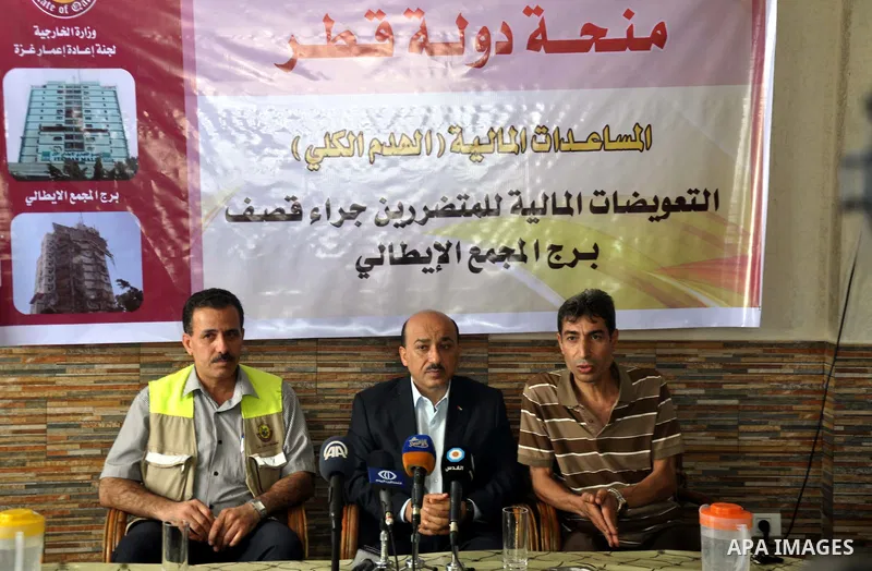 Palestinian Minister of public works and housing, Mufid al-Hasayna speaks during a press conference in Gaza City. September 6, 2014. Photo by Mohammed Talatene