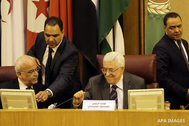 Saeb Erakat, top Palestinian negotiator, and Palestinian President Mahmoud Abbas attend the 142nd Arab League Foreign Ministers' meeting at the League's headquarters in Cairo, Egypt, 07 September 2014. According to media...
