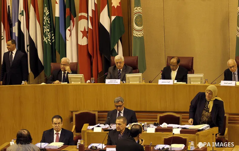 Saeb Erakat, top Palestinian negotiator, and Palestinian President Mahmoud Abbas attend the 142nd Arab League Foreign Ministers' meeting at the League's headquarters in Cairo, Egypt, 07 September 2014. According to media...