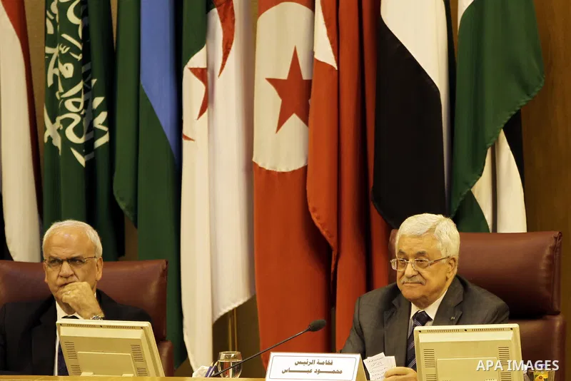 Saeb Erakat, top Palestinian negotiator, and Palestinian President Mahmoud Abbas attend the 142nd Arab League Foreign Ministers' meeting at the League's headquarters in Cairo, Egypt, 07 September 2014. According to media...