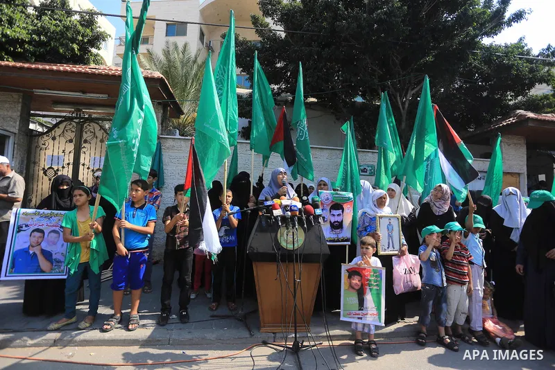 Palestinian women take part in a protest demanding the release of their relatives prisoners held in Israeli jails, in front of the Red Cross office in Gaza City, on Sep. 08, 2014. Photo by Mohammed Asad