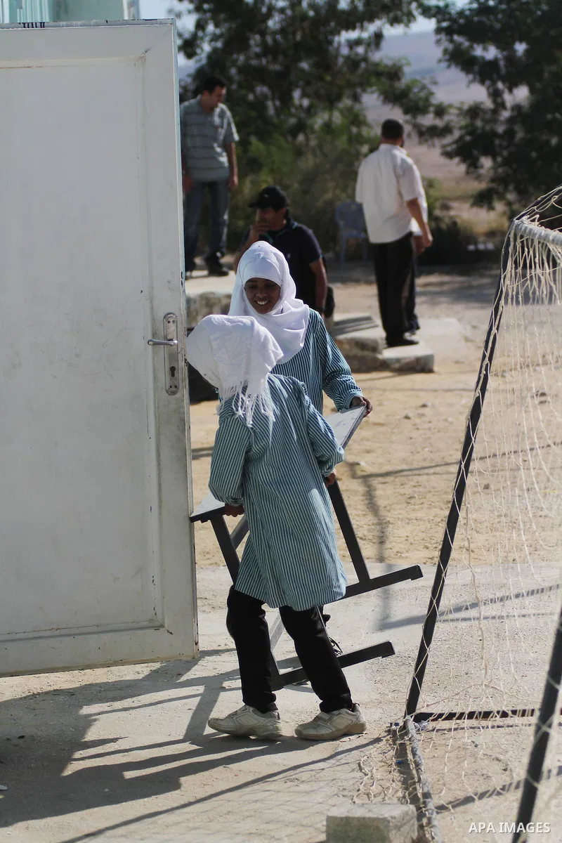 Palestinian Bedouin Students learn at Arab Al-Ka'abneh school in Al-Mu'arrajat area near the West Bank city of Jericho, on Sep. 08, 2014. Dozens of Palestinian children in the ramshackle Bedouin community outside Jerusal...