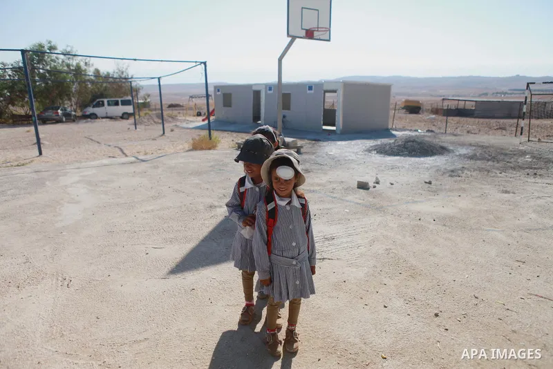 Palestinian Bedouin Students arrive to Arab Al-Ka'abneh school in Al-Mu'arrajat area near the West Bank city of Jericho, on Sep. 08, 2014. Dozens of Palestinian children in the ramshackle Bedouin community outside Jerusa...