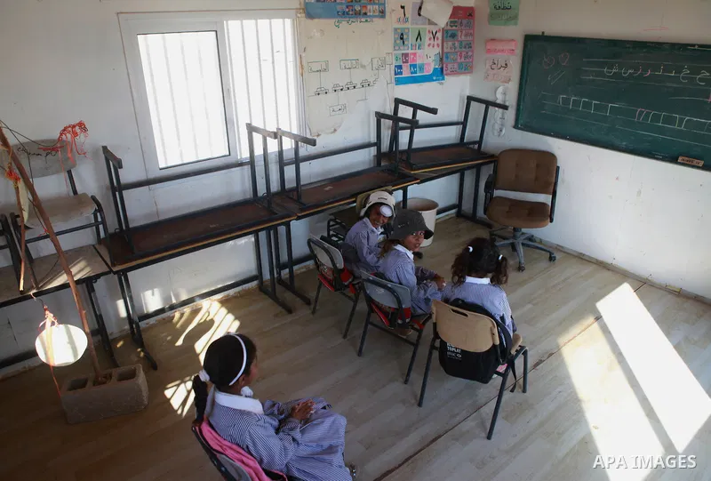 Palestinian Bedouin Students learn at Arab Al-Ka'abneh school in Al-Mu'arrajat area near the West Bank city of Jericho, on Sep. 08, 2014. Dozens of Palestinian children in the ramshackle Bedouin community outside Jerusal...