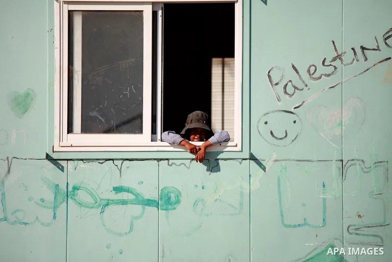A Palestinian Bedouin Student learns at Arab Al-Ka'abneh school in Al-Mu'arrajat area near the West Bank city of Jericho, on Sep. 08, 2014. Dozens of Palestinian children in the ramshackle Bedouin community outside Jerus...