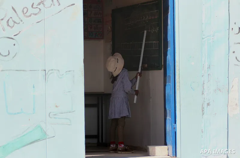 A Palestinian Bedouin Student learns at Arab Al-Ka'abneh school in Al-Mu'arrajat area near the West Bank city of Jericho, on Sep. 08, 2014. Dozens of Palestinian children in the ramshackle Bedouin community outside Jerus...