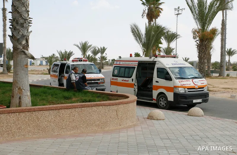 Palestinians ride an ambulance as they wait to be given the permission to cross into Egypt at the Rafah border crossing in the southern Gaza Strip, on Sep. 08, 2014. Calm returned to the coastal enclave in a August 26 ce...