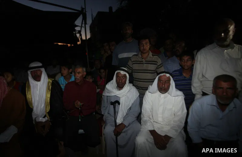 Palestinians attend a public speech during the visit of Senior leader of Hamas Ismail Haniyeh in the Deir al-Balah in the central Gaza Strip, on September 10, 2014. Hamas's exiled deputy leader said Wednesday that indire...