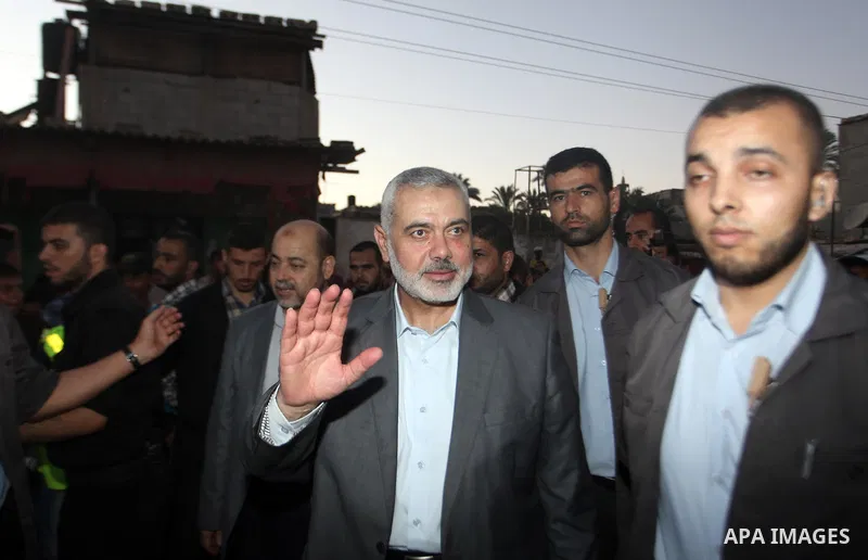 Senior leader of Hamas Ismail Haniyeh gets welcome during his inspection visit to the Deir al-Balah in the central Gaza Strip, on September 10, 2014. Hamas's exiled deputy leader said Wednesday that indirect talks with I...