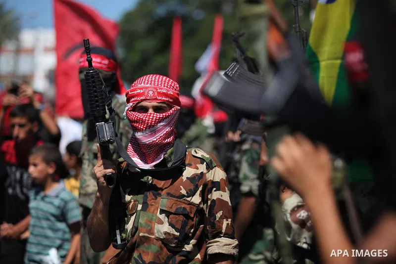 Palestinian militants from the Democratic Front for the Liberation of Palestine (DFLP) take part in a military show in Gaza City September 11, 2014. An open-ended ceasefire between Israel and Hamas-led Gaza militants, me...