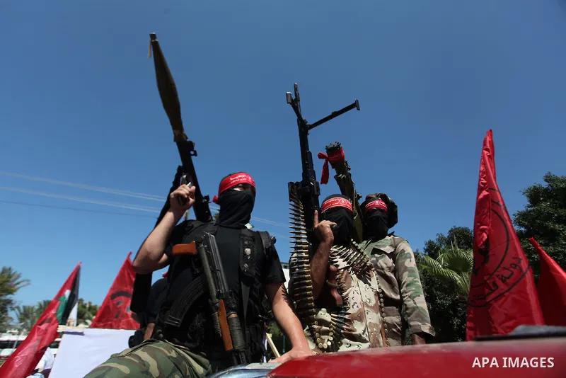 Palestinian militants from the Democratic Front for the Liberation of Palestine (DFLP) take part in a military show in Gaza City September 11, 2014. An open-ended ceasefire between Israel and Hamas-led Gaza militants, me...