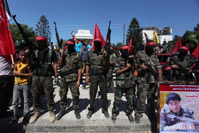 Palestinian militants from the Democratic Front for the Liberation of Palestine (DFLP) take part in a military show in Gaza City September 11, 2014. An open-ended ceasefire between Israel and Hamas-led Gaza militants, me...