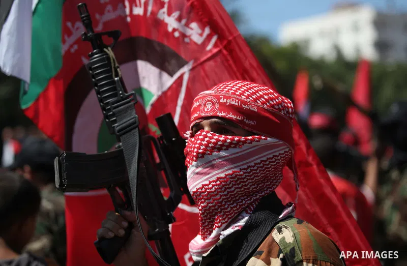 Palestinian militants from the Democratic Front for the Liberation of Palestine (DFLP) take part in a military show in Gaza City September 11, 2014. An open-ended ceasefire between Israel and Hamas-led Gaza militants, me...