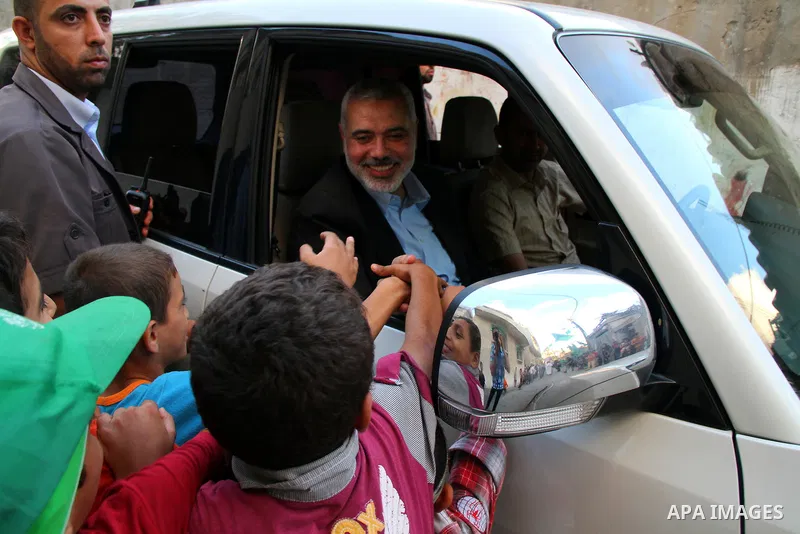 Senior leader of Hamas Ismail Haniyeh gets welcome during his inspection visit to Rafah in the southern Gaza Strip, on September 12, 2014. Hamas's exiled deputy leader said Wednesday that indirect talks with Israel to co...