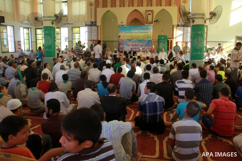 Senior leader of Hamas Ismail Haniyeh gets welcome during his inspection visit to Rafah in the southern Gaza Strip, on September 12, 2014. Hamas's exiled deputy leader said Wednesday that indirect talks with Israel to co...
