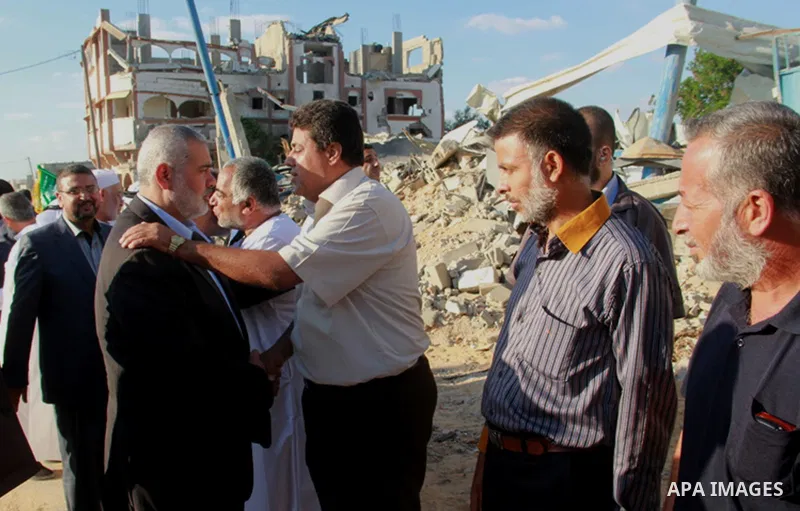 Senior leader of Hamas Ismail Haniyeh gets welcome during his inspection visit to Rafah in the southern Gaza Strip, on September 12, 2014. Hamas's exiled deputy leader said Wednesday that indirect talks with Israel to co...