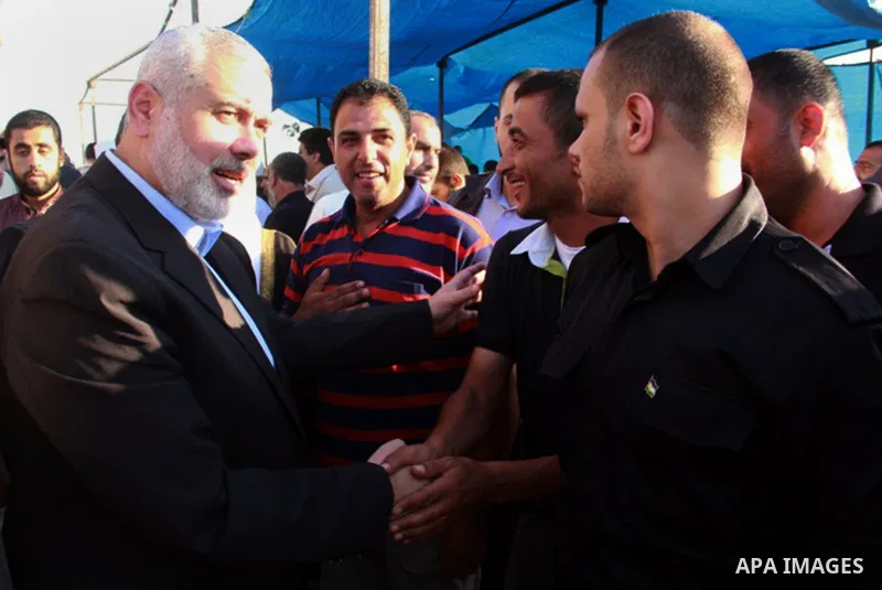 Senior leader of Hamas Ismail Haniyeh gets welcome during his inspection visit to Rafah in the southern Gaza Strip, on September 12, 2014. Hamas's exiled deputy leader said Wednesday that indirect talks with Israel to co...