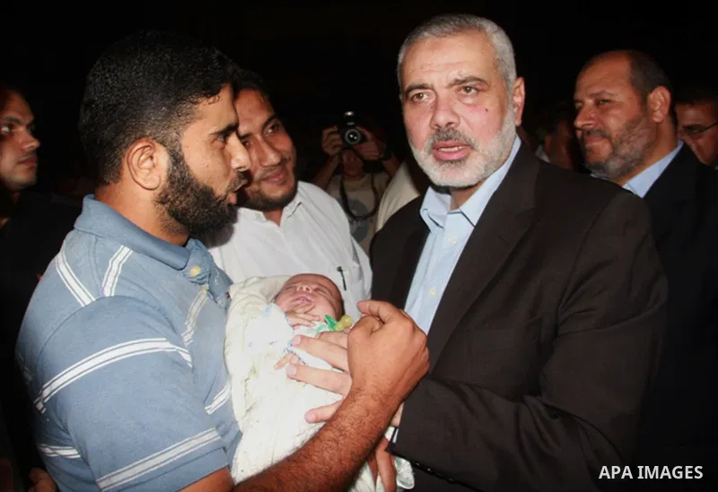 Senior leader of Hamas Ismail Haniyeh gets welcome during his inspection visit to Rafah in the southern Gaza Strip, on September 12, 2014. Hamas's exiled deputy leader said Wednesday that indirect talks with Israel to co...