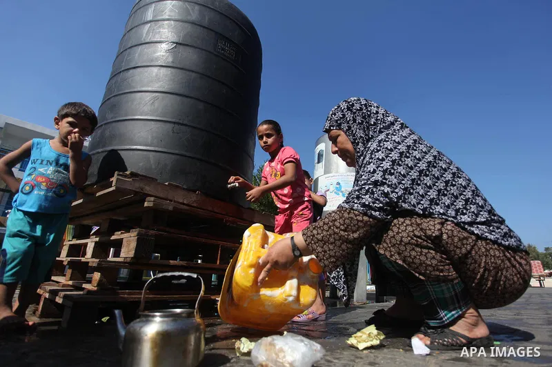 Displaced Palestinians shelter at a United Nations-run school, in Gaza city, on Sept. 13, 2014. Some 34 school buildings in Gaza are damaged beyond repair and 31 more are still being used as shelters, while Gaza prepare...