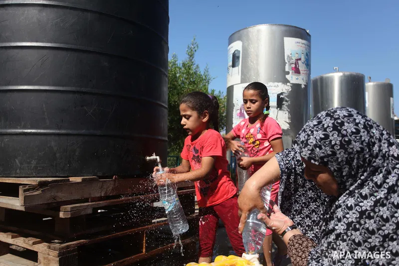 Displaced Palestinians shelter at a United Nations-run school, in Gaza city, on Sept. 13, 2014. Some 34 school buildings in Gaza are damaged beyond repair and 31 more are still being used as shelters, while Gaza prepare...