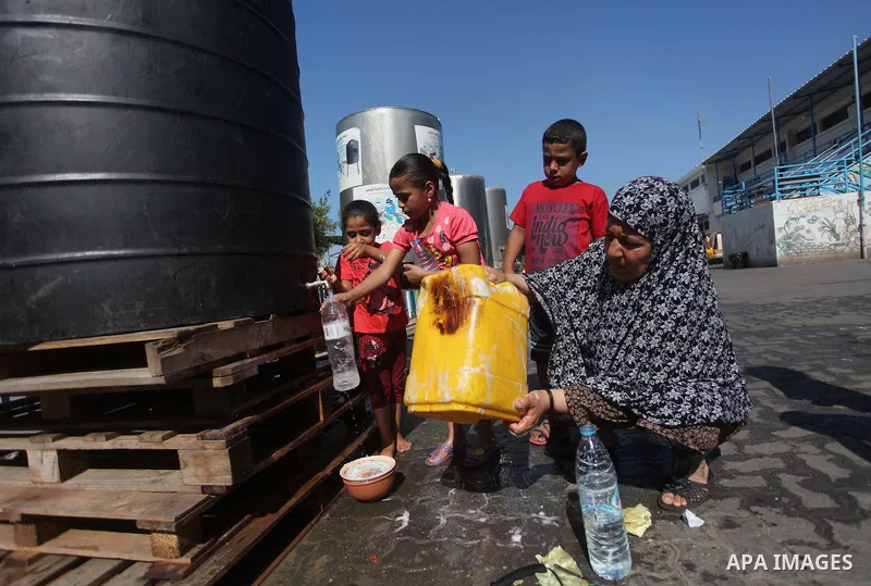 Displaced Palestinians shelter at a United Nations-run school, in Gaza city, on Sept. 13, 2014. Some 34 school buildings in Gaza are damaged beyond repair and 31 more are still being used as shelters, while Gaza prepare...