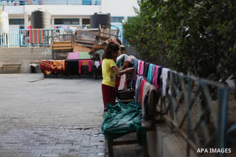 Displaced Palestinians shelter at a United Nations-run school, in Gaza city, on Sept. 13, 2014. Some 34 school buildings in Gaza are damaged beyond repair and 31 more are still being used as shelters, while Gaza prepare...